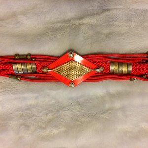 Women's Red 26" belt, with intricate knotting, and hook closure